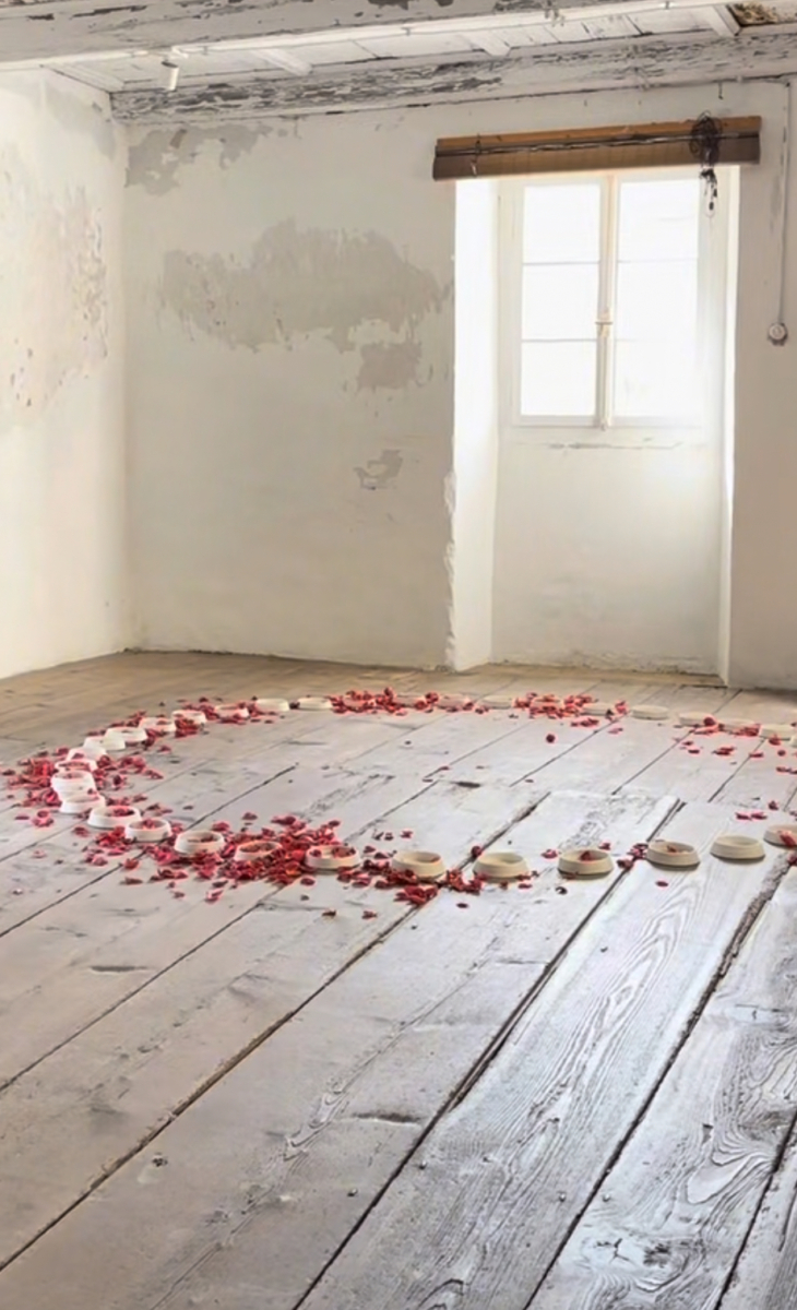 Studio scene – winter is over. April 2024. Floor installation, white porcelain vessels.